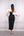Yakası Asimetrik Kesim Görünümlü Omuzu Broş Detaylı Midi Boy Elbise Siyah-Beyaz